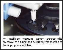 An intelligent vacuum system senses the presence of a blank and delicately transports it to the appropriate sort bin.